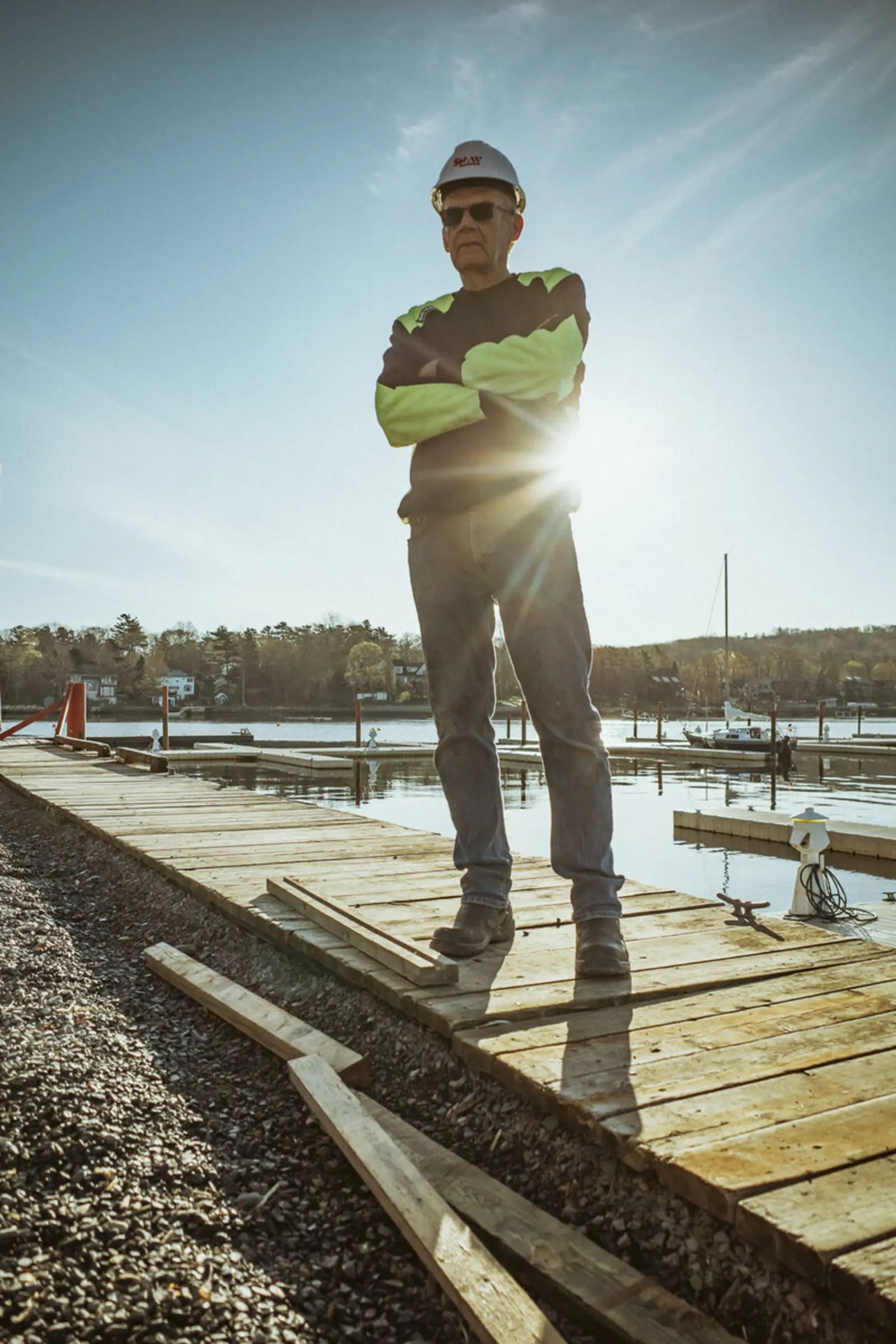 Club member standing on a marina dock